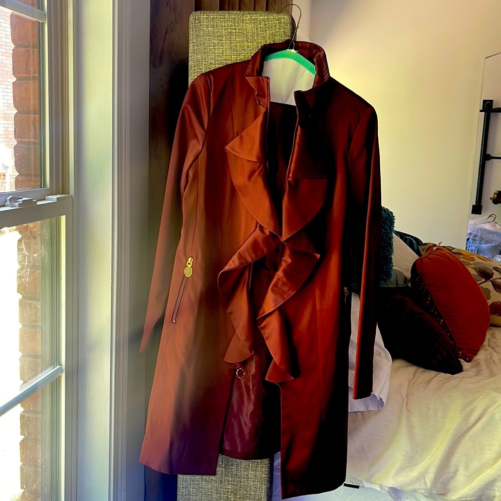 Tahari size small.  The color shows a brown/burgundy in the sunlight